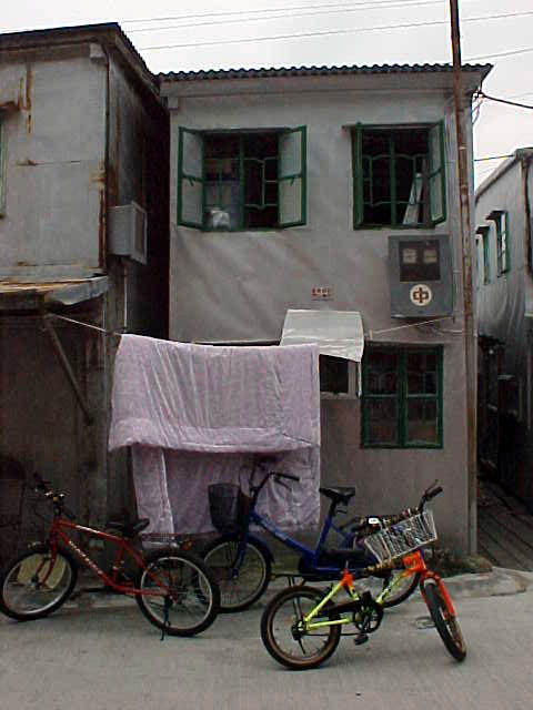 Older homes in Tai O - Sturctures are faces with aluminum.