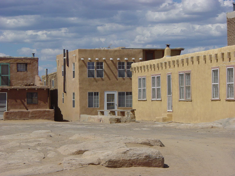 Houses in Acoma: The protruding beams or vegas support the ceiling and roof.