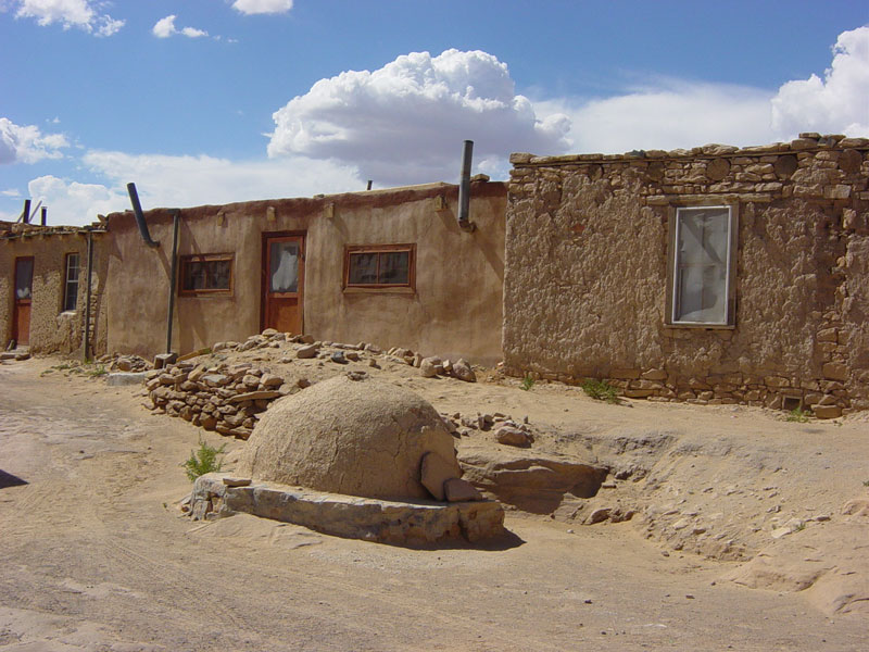 A horno (adobe oven) outside a house in Acoma