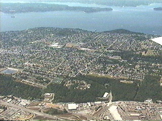 Flying over Puget Sound south from Seattle Washington
