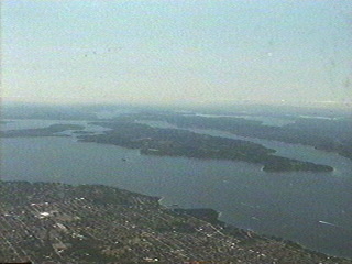 Flying over Puget Sound south from Seattle Washington