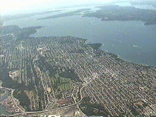 Flying over Puget Sound south from Seattle Washington