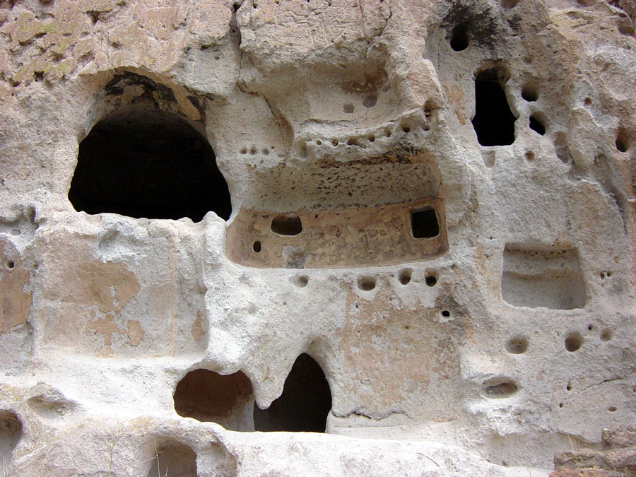 Many caves pockmark the wall of the canyon. Some sheltered back walls still retain the paint of the ancient homes.