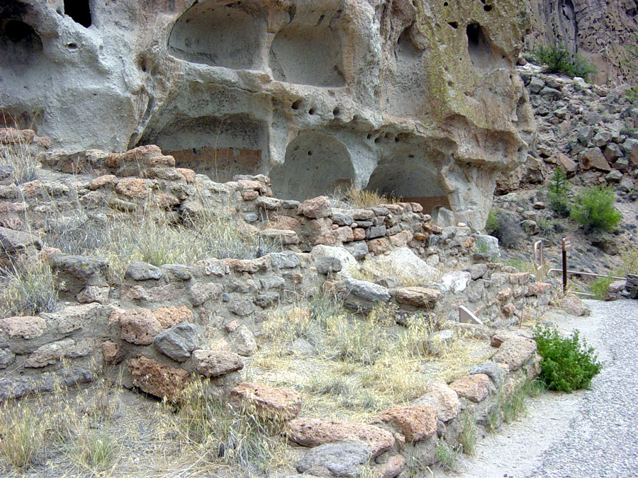 The cave spaces were extended by houses built in front of them.