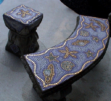 Original mosaic design on patio bench and table