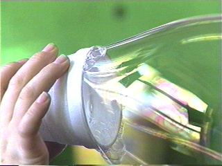 Child blowing soap bubble