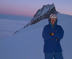 Mountain climber on Mt. Hood in Oregon. The climb was begun at 1 am during and ice and rain storm. By 3 am they were above the clouds at 8,000 ft. The climbers reached the summit, 11,245 ft., around 9 am and returned to base camp by noon. This was an 11 hr. climb.