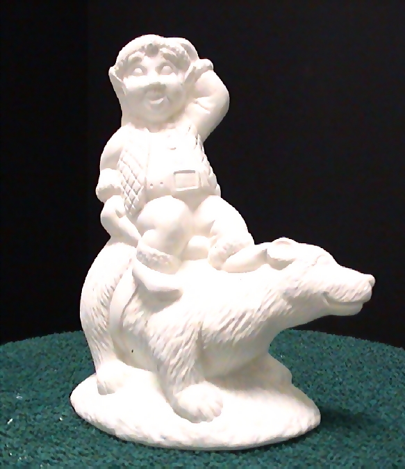 Ceramic clown riding a bear