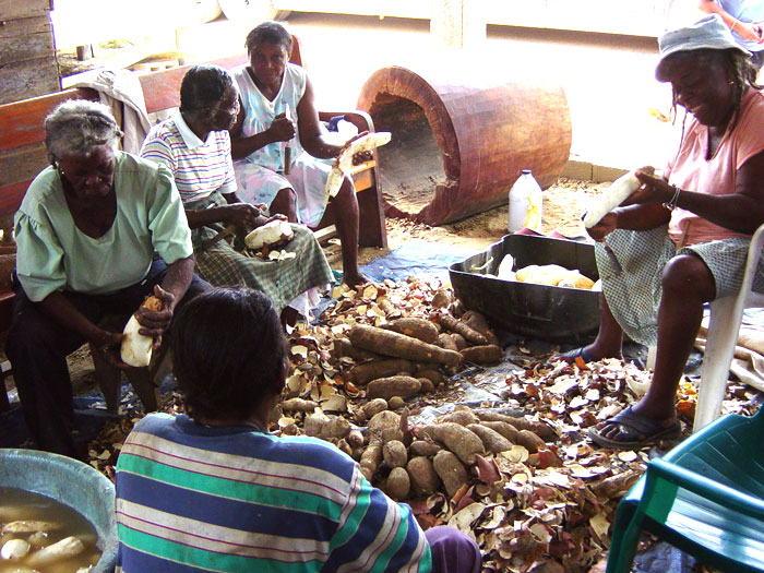 Peeling Cassavas in Dangriga