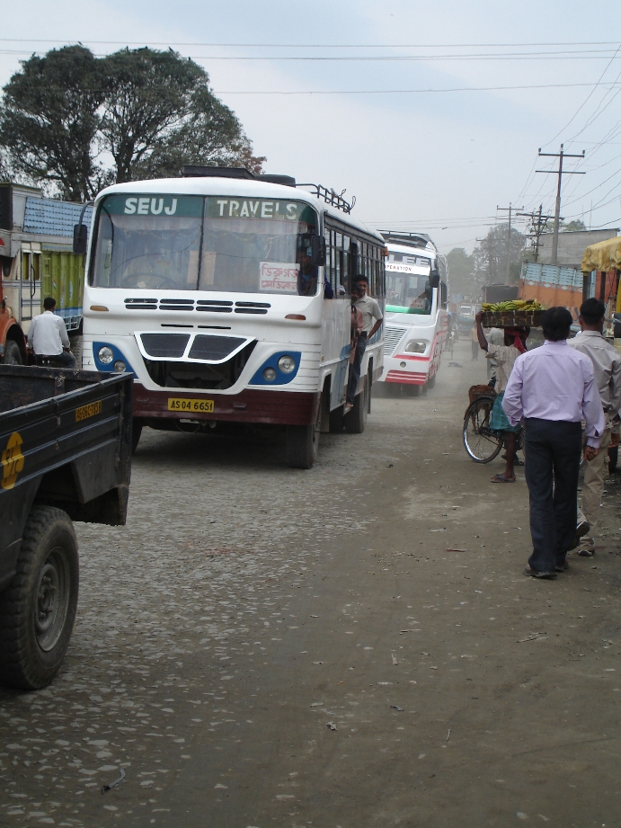 Street scene with busses and people