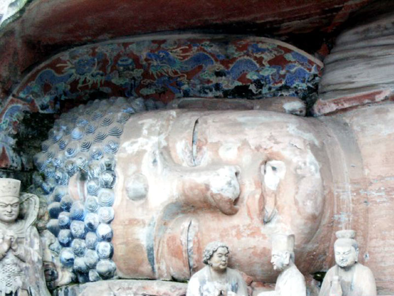 Figure of Buddha entering Nirvana. This carving of the reclining Buddha is over 100 feet long.