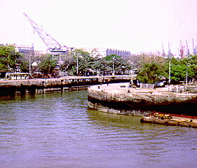 Canal and bridge moving ship at Bombay