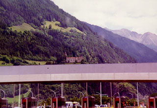 Castle in background of toll booths