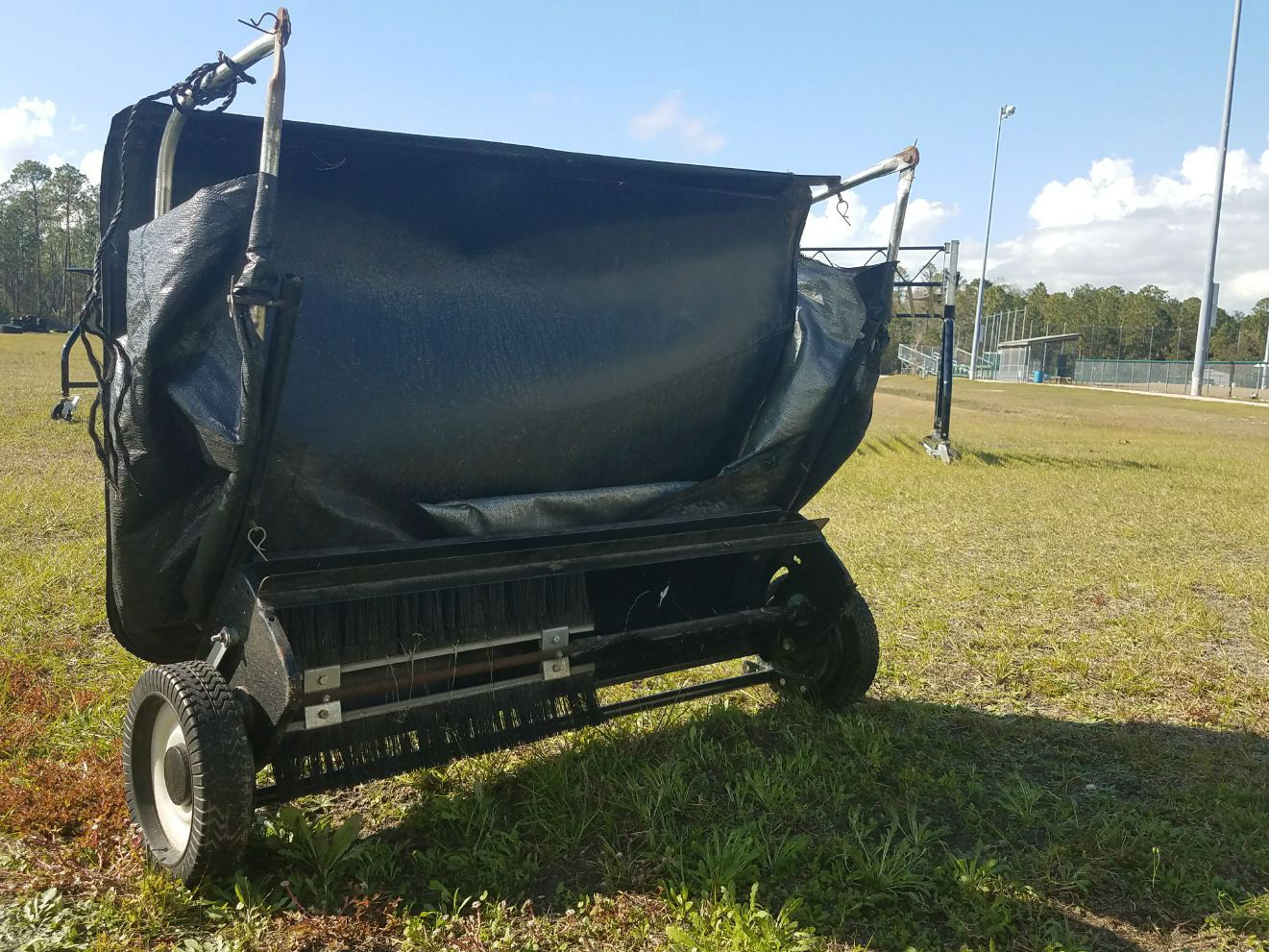 Grounds keeping machine