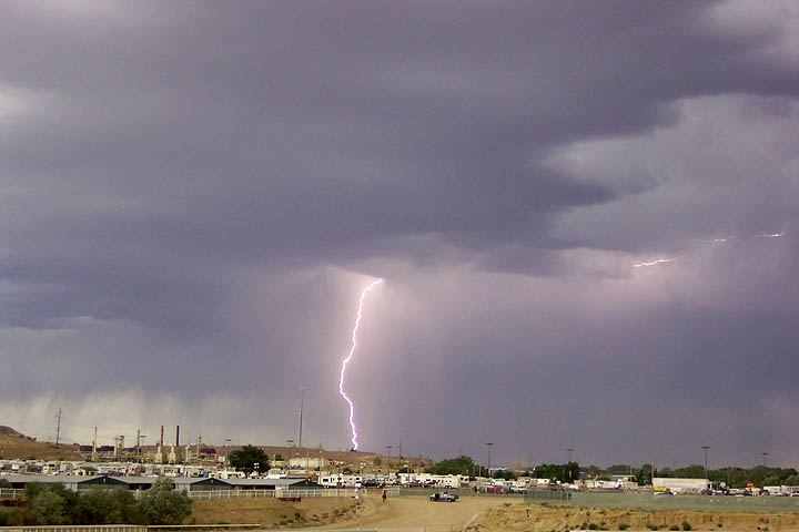 A lightening strike over the fhill in New Mexico