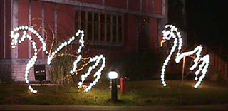 Holiday lighted swans