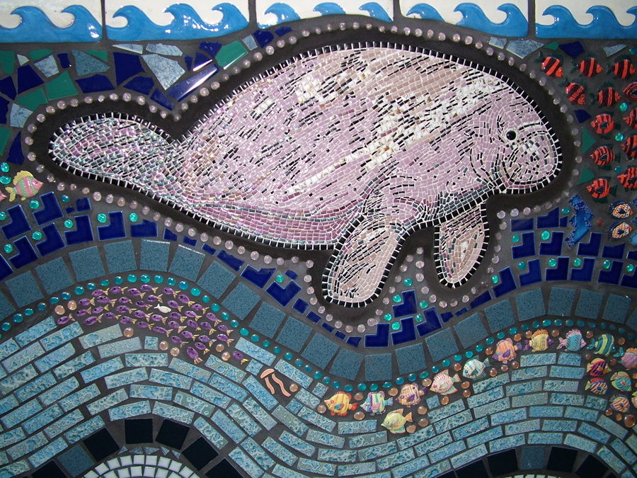 Mosaic wall of an ocean scene with a Manatee.