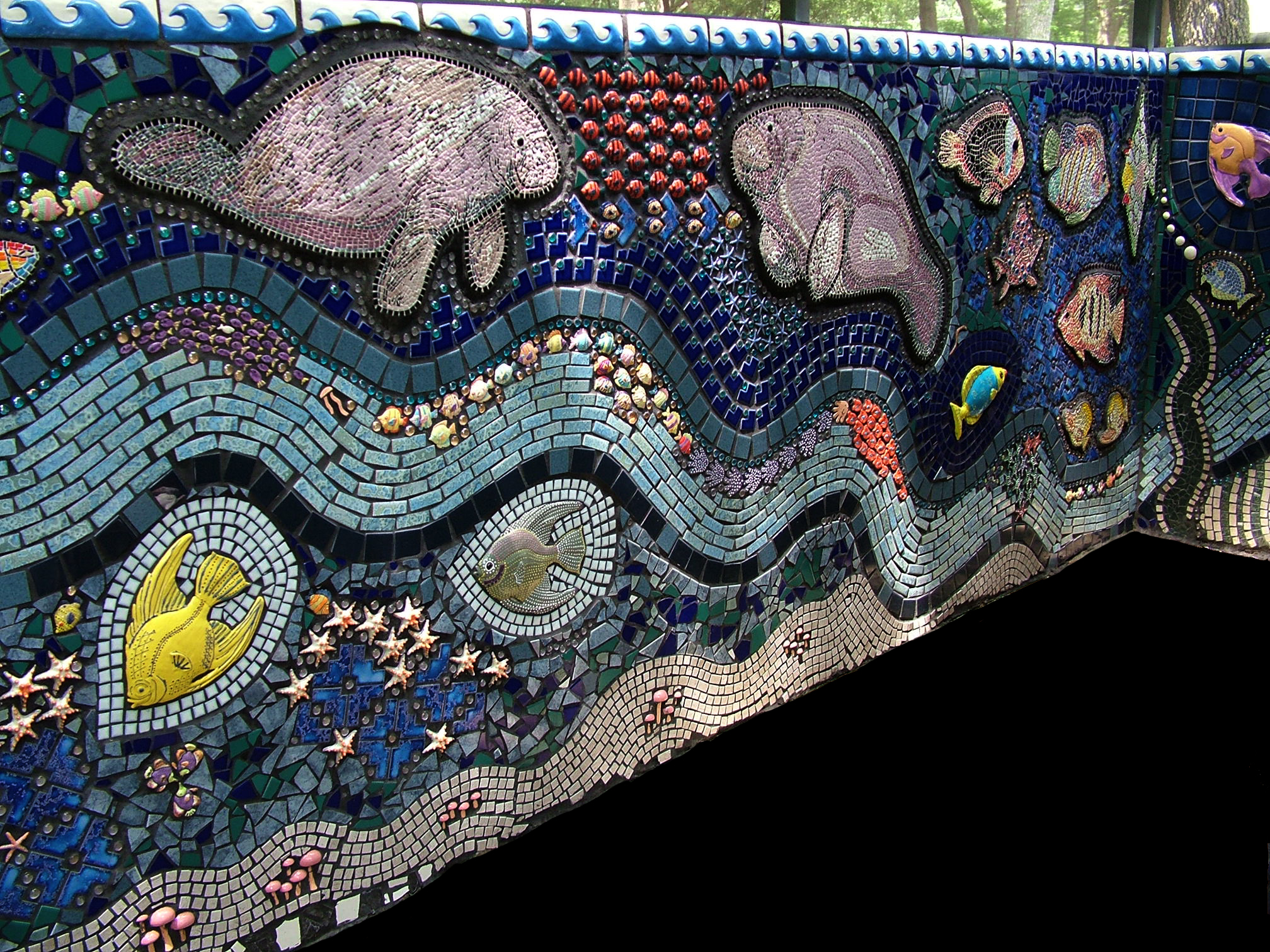 15 foot section of a 50 foot by 6 foot tall mosaic wall.