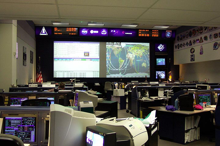 Inside the Mission Control Center for the International Space Station at Johnson Space Center. The crew aboard the ISS is watched over 24 hours a day by flight controllers in this room.