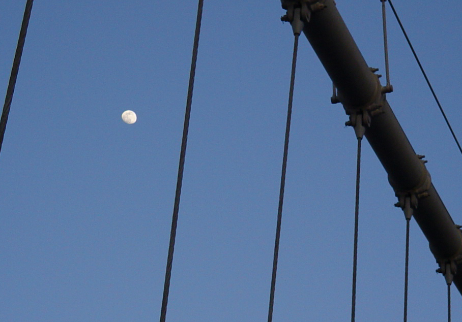 Moon through the cables of the Brooklyn Bridge