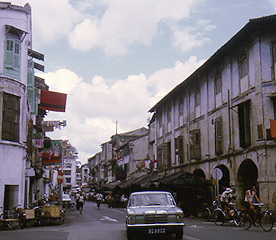 Street scene (notice clothes hanging on rods from windows)