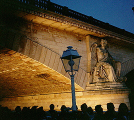 Paris, France at night on River Seine boat ride