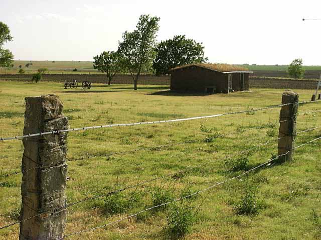 Post Rock fence and sod house