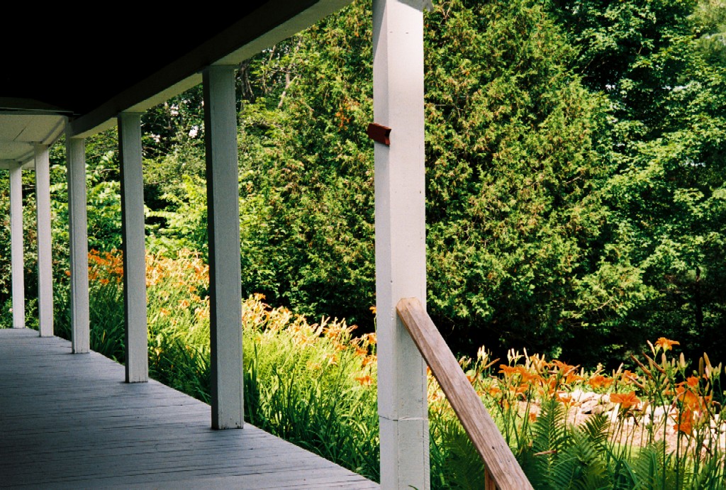 Farm house, views, and woods of the Robert Frost home near Derry, New Hampshire. This is the home where Frost became a serious poet and created many of the poems published in his first collection.