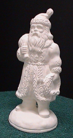 Ceramic Santa holding a bag and wreath