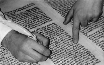 Scriber working on Torah Scroll