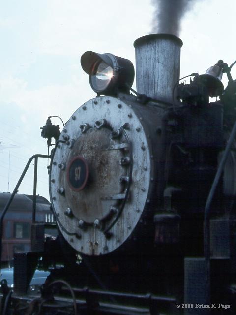 Steam railroad engine underway.