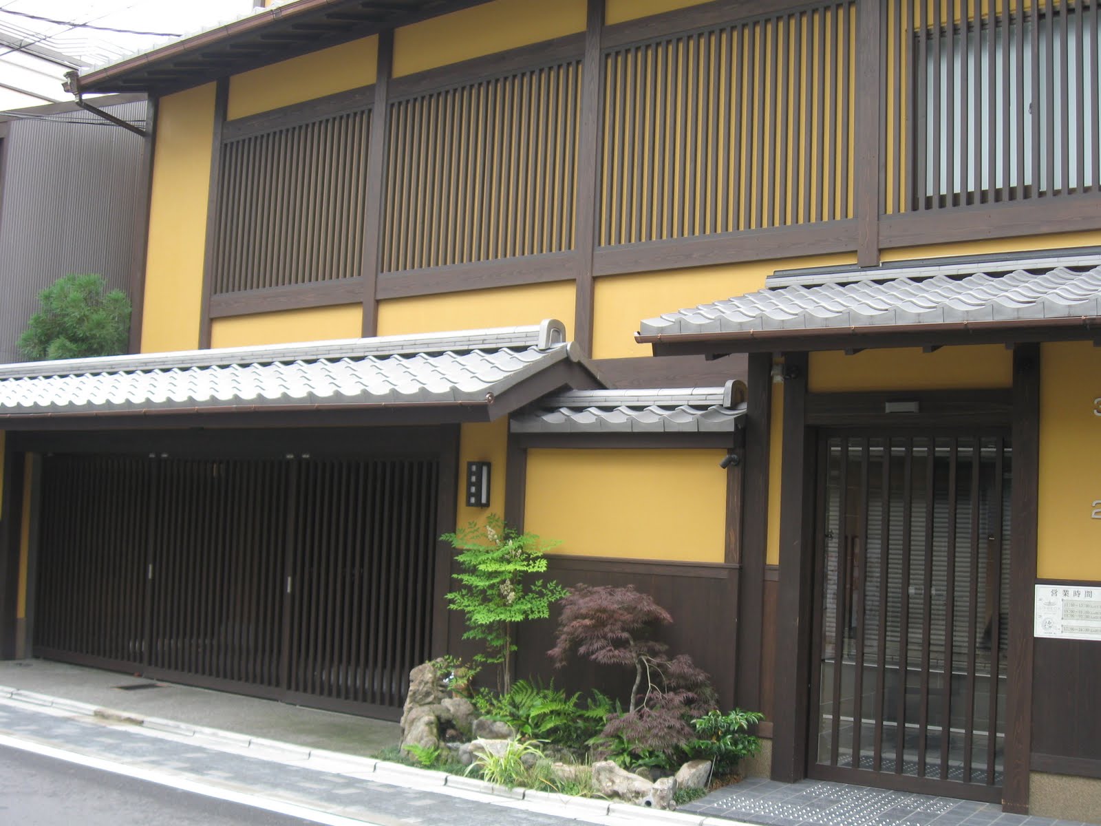 street scene with small garden, Kyoto, Japan