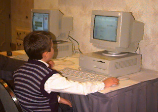 Student using a computer at the Governor's Summit in Orlando Florida