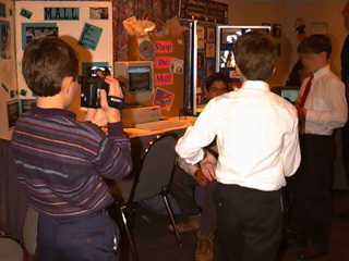 Students video taping the exhibits at Governor's Summit January 1997 Orlando Florida