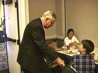 Orange County Public Schools Superintendent Donald Shaw greeting students at the Governor's Summit January 1997 Orlando Florida