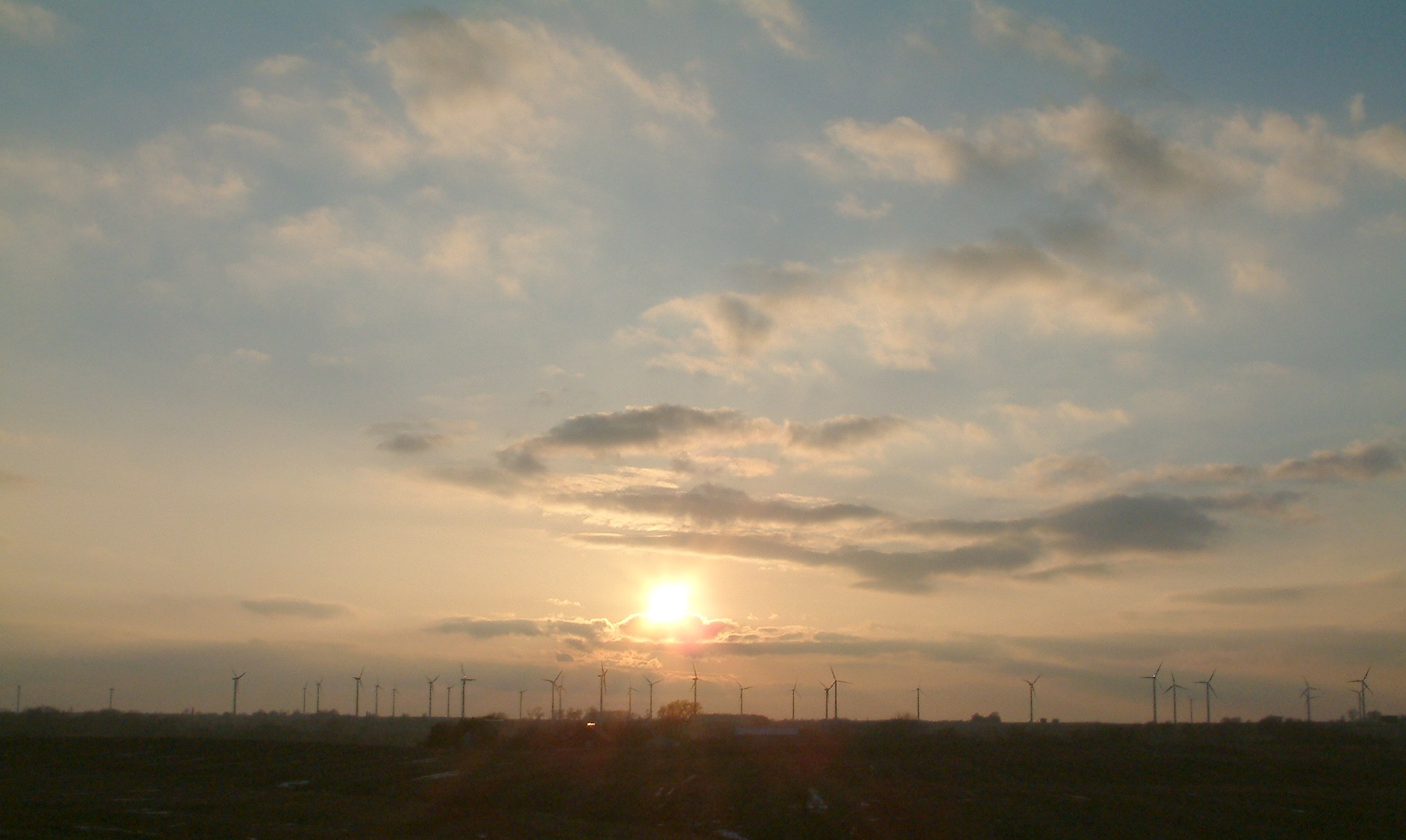 Wind Farm with Sunset Backdrop