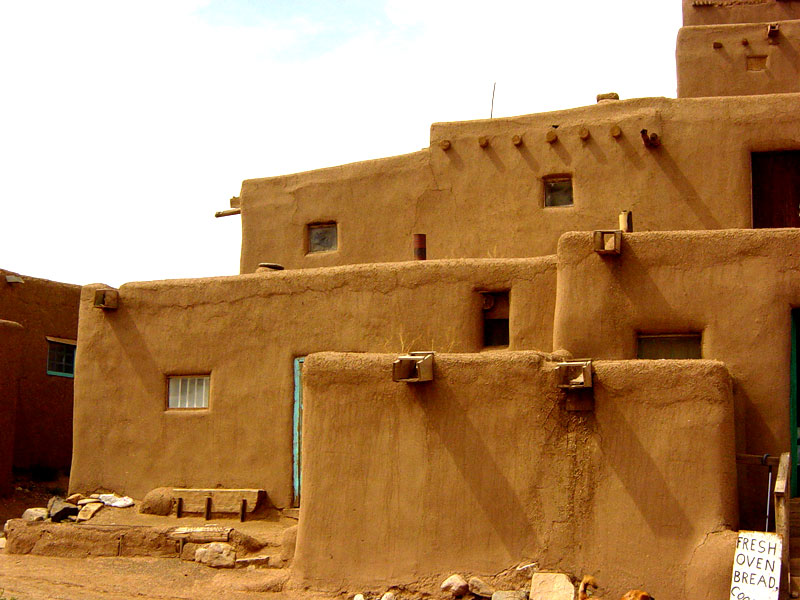 The walls are refinished with a new coat of adobe plaster as necessary.