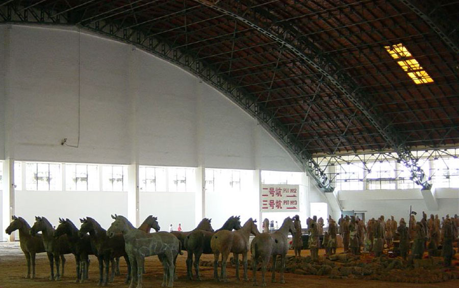 The holes were put in the horses to keep them from exploding during the firing of the clay in the kilns.