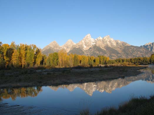 tetonsunrisesnakereflection.jpg