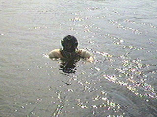 Sponge diver beginning his harvest