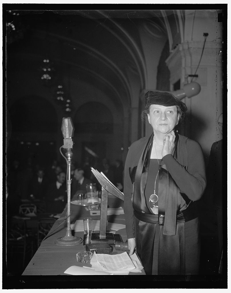 Mme. Secretary of Labor Frances Perkins as she surveyed the audience before beginning her address before the Conference of Industry and Labor today