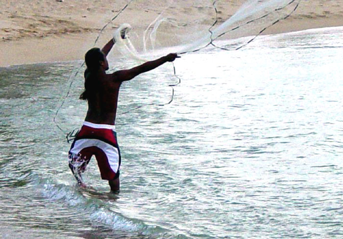 Hawaiian Fisherman Throwing Net