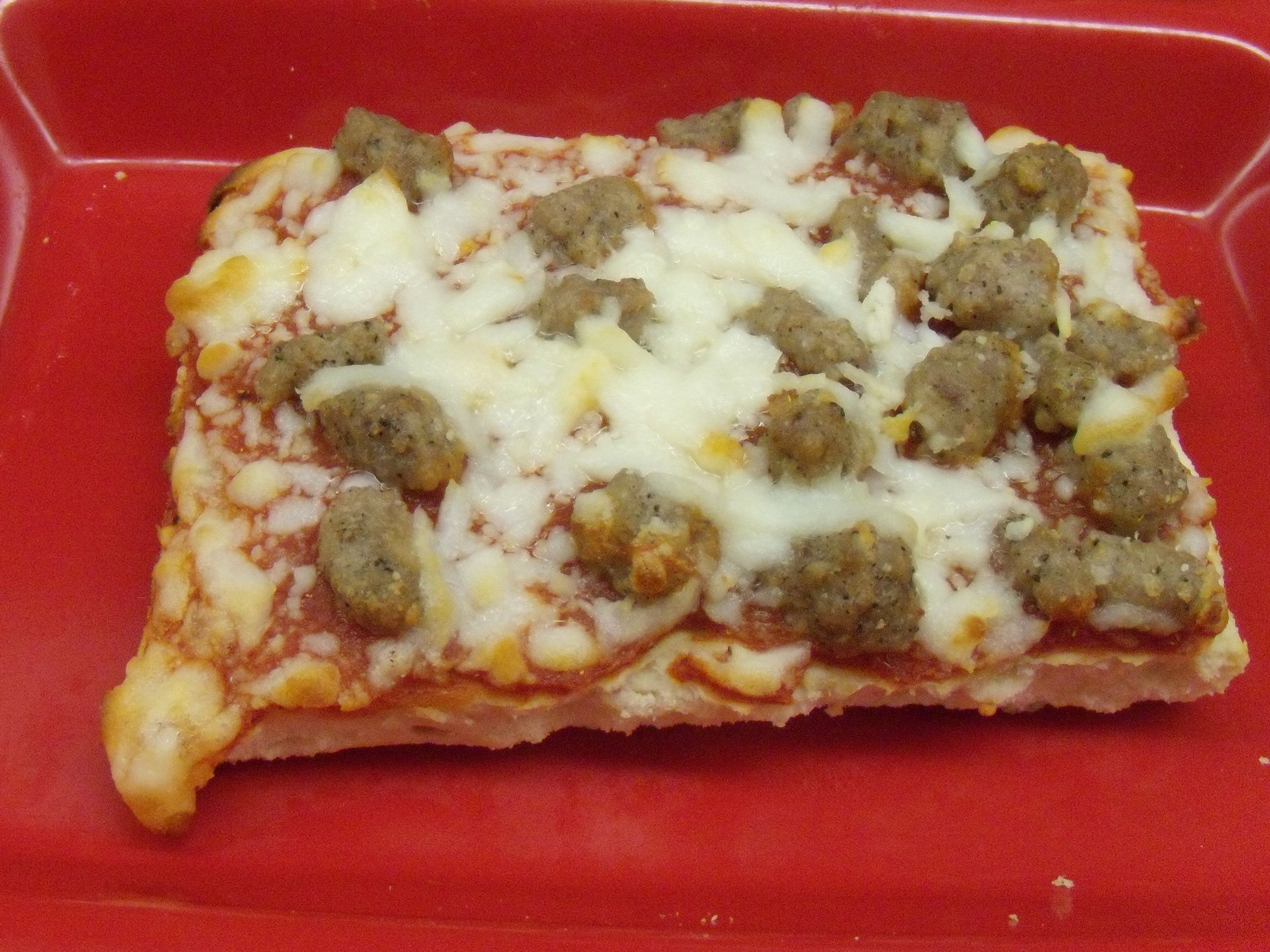 Sausage pizza from the cafeteria | Pics4Learning